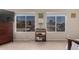Bedroom featuring large windows, custom window coverings, and views of the desert at 818 E Hiddenview Dr, Phoenix, AZ 85048