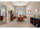 Dining room boasts natural light, neutral colors, carpet, and plenty of space for entertaining at 818 E Hiddenview Dr, Phoenix, AZ 85048