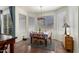 Bright breakfast nook with large windows and a sliding glass door to the backyard at 818 E Hiddenview Dr, Phoenix, AZ 85048
