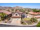 Beautiful home showcasing manicured landscaping and a well-designed facade with mountain views at 818 E Hiddenview Dr, Phoenix, AZ 85048