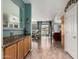 Hallway featuring views to the kitchen, living room, and sliding glass door out to the backyard at 818 E Hiddenview Dr, Phoenix, AZ 85048