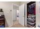 Hallway closet with well organized shelves and hanging space for storage at 818 E Hiddenview Dr, Phoenix, AZ 85048