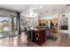 Spacious kitchen featuring a center island, stainless steel appliances, and lots of counter space at 818 E Hiddenview Dr, Phoenix, AZ 85048