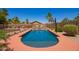 Refreshing pool surrounded by lush landscaping and ample seating, creating a relaxing outdoor retreat at 818 E Hiddenview Dr, Phoenix, AZ 85048