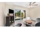 Bright and airy living room with a large window, comfortable seating, and modern decor at 8210 E Garfield St # K23, Scottsdale, AZ 85257