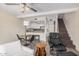 Cozy living room adjacent to kitchen with contemporary furnishings and plenty of natural light at 8210 E Garfield St # K23, Scottsdale, AZ 85257