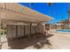 Well-organized community mailboxes under a covered area, with a convenient trash bin and community information board at 8210 E Garfield St # K23, Scottsdale, AZ 85257
