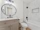 Modern bathroom features decorative vanity and shower-tub combo with decorative tile at 830 S Dobson Rd # 19, Mesa, AZ 85202