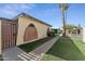 Charming condo with unique arched entryway and landscaped walkway leading to a refreshing community pool at 830 S Dobson Rd # 19, Mesa, AZ 85202
