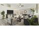 Bright and airy living room with an open floor plan, stylish furniture, and elegant decor at 8620 W Denton Ln, Glendale, AZ 85305
