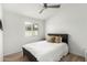 Bright bedroom features a ceiling fan, wood-look floors, and a light color palette at 8835 W John Cabot Rd, Peoria, AZ 85382
