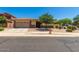 Charming single-story home with a well-maintained front yard and a two-car garage at 11249 N 161St Ave, Surprise, AZ 85379