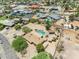 Large desert property with pool, cabana, mature trees, and a circular driveway in a residential neighborhood at 12212 N 66Th St, Scottsdale, AZ 85254