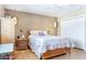 Cozy bedroom featuring warm colored walls, wood floors, hanging pendant lighting, and spacious closet at 12212 N 66Th St, Scottsdale, AZ 85254