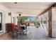 Covered patio with comfortable seating, creating a relaxing outdoor living space for entertaining and enjoying the weather at 12212 N 66Th St, Scottsdale, AZ 85254