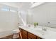Bathroom features a double sink vanity and a shower-tub combo at 1239 W Descanso Canyon Dr, Casa Grande, AZ 85122