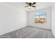 Bedroom with carpet and a window with neighborhood views at 1239 W Descanso Canyon Dr, Casa Grande, AZ 85122