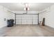 Spacious two car garage with automatic door, utility hook ups, and painted floor at 1239 W Descanso Canyon Dr, Casa Grande, AZ 85122