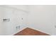 Simple laundry room with tile floors and shelving at 1239 W Descanso Canyon Dr, Casa Grande, AZ 85122