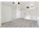 Open living room features light grey carpet, white walls, and plenty of space at 1239 W Descanso Canyon Dr, Casa Grande, AZ 85122
