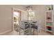 Charming breakfast nook with seating for four and access to the outdoors at 13041 S 45Th Pl, Phoenix, AZ 85044