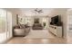 Comfortable living area with plush sofas, a ceiling fan, and bright white shutters at 13041 S 45Th Pl, Phoenix, AZ 85044