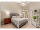 Serene main bedroom with high ceilings, ensuite access, and neutral decor at 13041 S 45Th Pl, Phoenix, AZ 85044