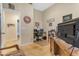 Office featuring tile flooring, a desk, and office chair at 13824 W Gelding Dr, Surprise, AZ 85379