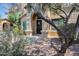 Charming home with a desert landscaped yard, arched entryway and covered front porch at 14300 W Bell Rd # 312, Surprise, AZ 85374