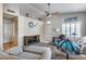 Spacious living room with vaulted ceilings, ceiling fan and ample seating at 14300 W Bell Rd # 312, Surprise, AZ 85374