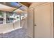 Enclosed patio featuring tiled floors and a shaded canopy, perfect for relaxation at 14300 W Bell Rd # 312, Surprise, AZ 85374