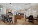 Spacious kitchen with dark countertops, central island, and stainless steel appliances at 14517 W Cortez St, Surprise, AZ 85379
