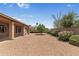 Expansive backyard featuring gravel landscaping and a covered patio perfect for outdoor living at 15032 N 54Th Pl, Scottsdale, AZ 85254