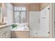Modern bathroom featuring a separate shower, soaking tub and tiled floor at 15032 N 54Th Pl, Scottsdale, AZ 85254
