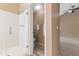 Clean bathroom with a glass-enclosed shower and tiled floors at 15032 N 54Th Pl, Scottsdale, AZ 85254
