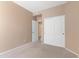 Bedroom featuring neutral paint, closet and carpet, providing ample space and comfort at 15032 N 54Th Pl, Scottsdale, AZ 85254