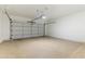 Clean, spacious garage with ample room for parking and storage possibilities at 15032 N 54Th Pl, Scottsdale, AZ 85254