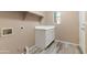 Functional laundry area with storage cabinets and convenient utility connections at 15032 N 54Th Pl, Scottsdale, AZ 85254