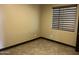 Neutral colored bedroom featuring a large window that provides plenty of natural light at 15625 N Jerry St, Surprise, AZ 85378