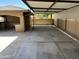 Large carport attached to backyard cabana with granite countertops and sink at 15625 N Jerry St, Surprise, AZ 85378