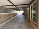 A long carport provides ample covered parking at 15625 N Jerry St, Surprise, AZ 85378