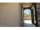 Attractive architectural details with stone accents, stucco walls, and a covered walkway for a welcoming feel at 15625 N Jerry St, Surprise, AZ 85378