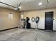 Spacious garage featuring storage and a water filtration system at 15625 N Jerry St, Surprise, AZ 85378