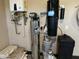 Close up of water filtration system and wall mounted vacuum in a garage at 15625 N Jerry St, Surprise, AZ 85378