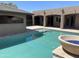 The backyard features a pool, cabana, and a fire pit at 15625 N Jerry St, Surprise, AZ 85378