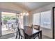 Dining area with patio access, perfect for entertaining guests and enjoying outdoor views at 17317 N Ponca Way, Surprise, AZ 85374