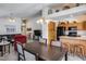 Open-concept kitchen and living area, ideal for Gathering gatherings and social events at 17317 N Ponca Way, Surprise, AZ 85374