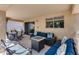 Relaxing covered patio with comfortable outdoor furniture, perfect for entertaining at 17317 N Ponca Way, Surprise, AZ 85374
