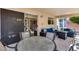 Charming patio with outdoor seating and serene views at 17317 N Ponca Way, Surprise, AZ 85374