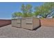 Storage sheds in the backyard at 1932 S 220Th Dr, Buckeye, AZ 85326